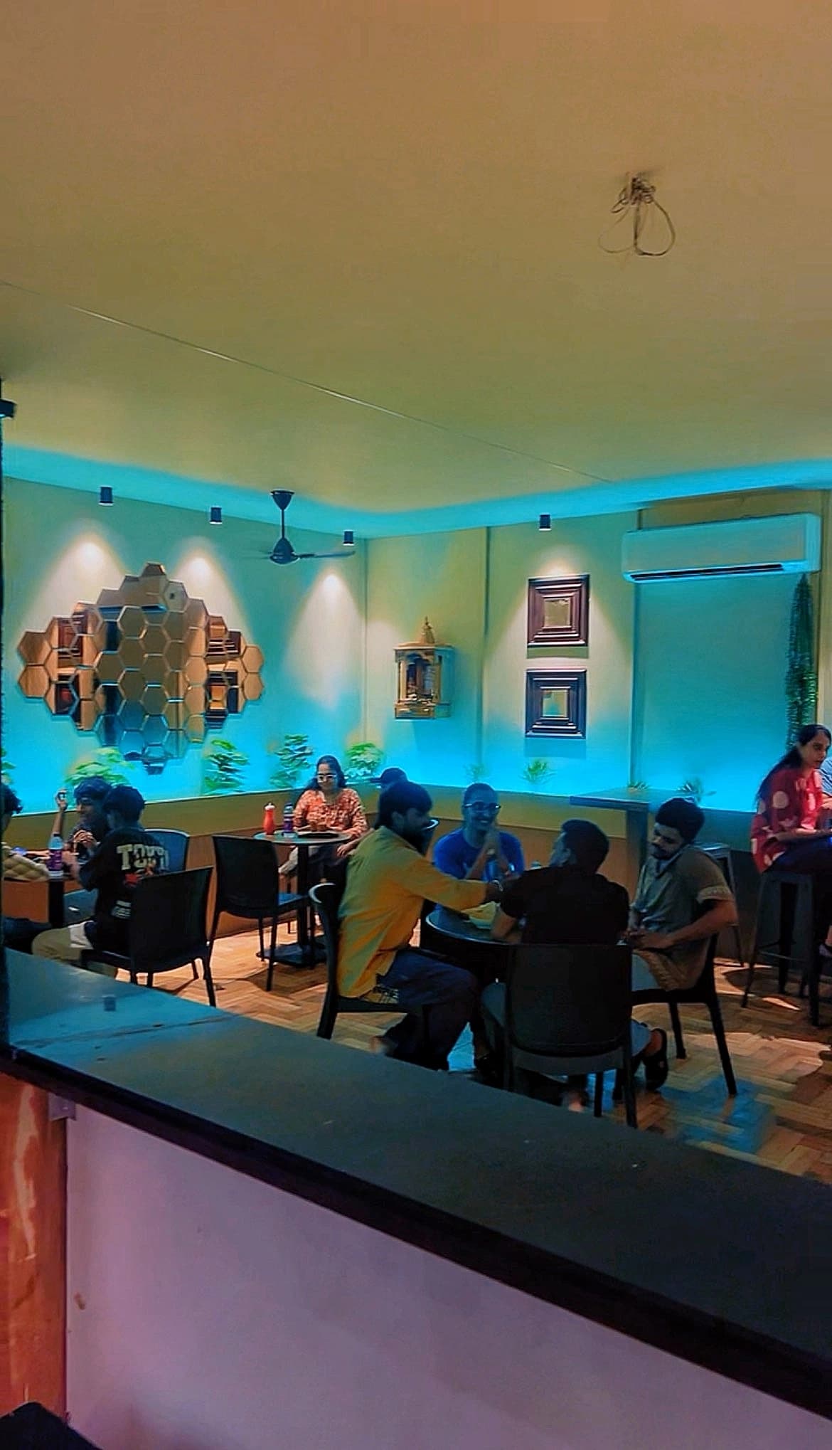 Cozy interior seating area at Chai Sutta Bar Bharuch