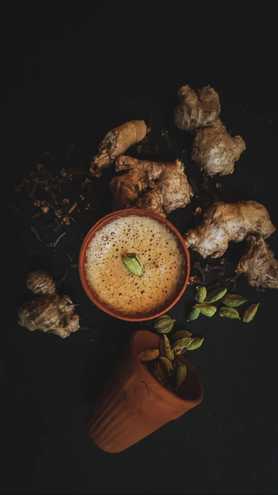 Creamy patterned beverage served at Chai Sutta Bar Bharuch